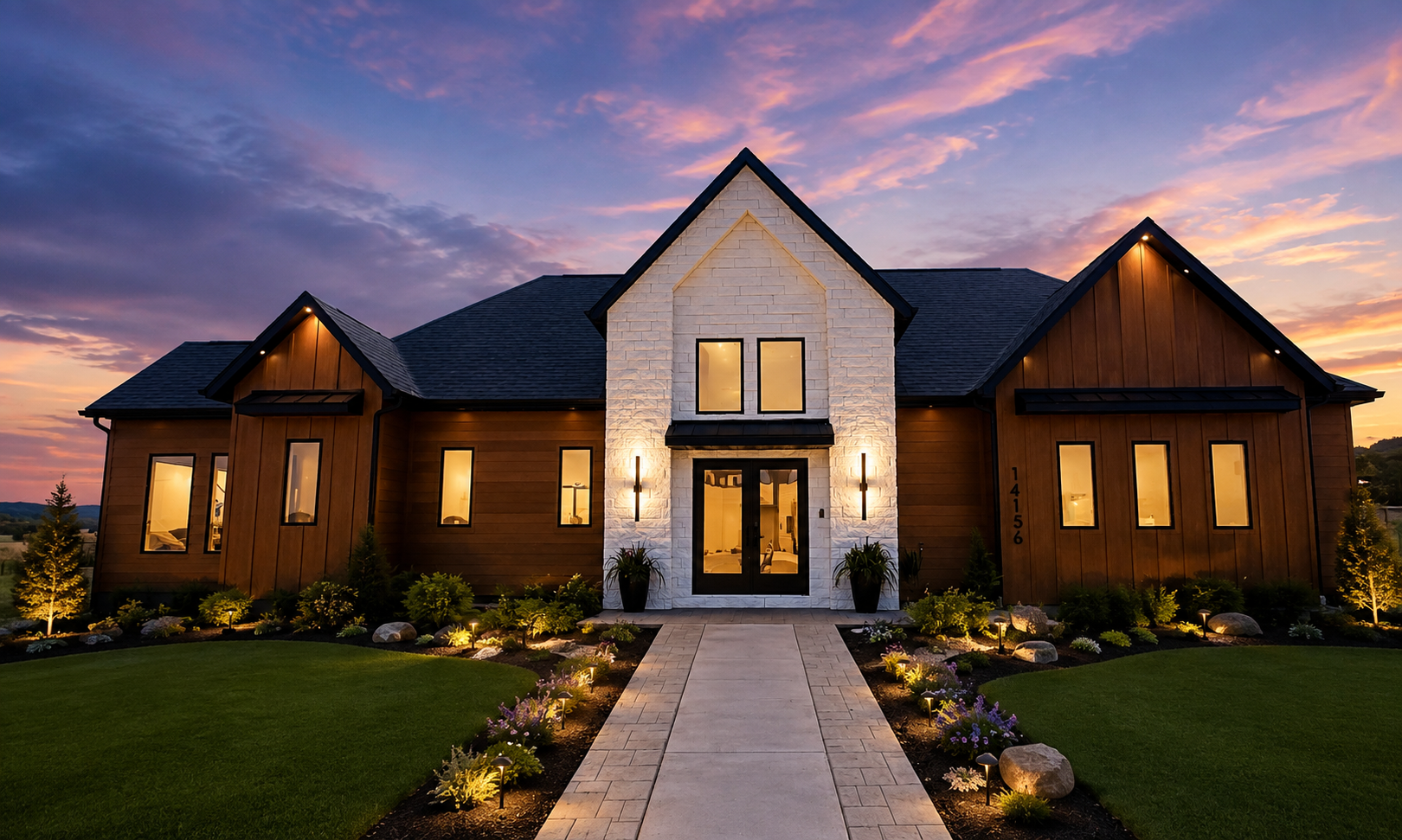 Newhouse Builds custom home front elevation with stone, black siding and timber entry